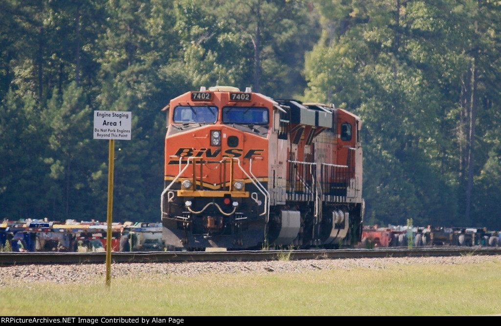 BNSF 7402 leads